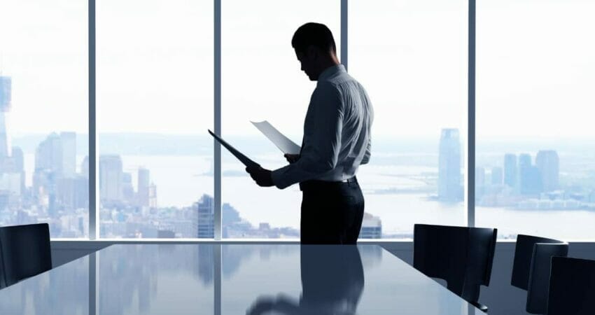 man standing by window